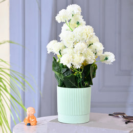 White Faux Plant in Lined Plastic Pot