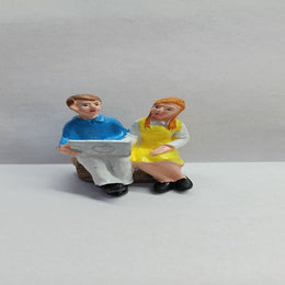 Boy and Girl sitting with Laptop Impor